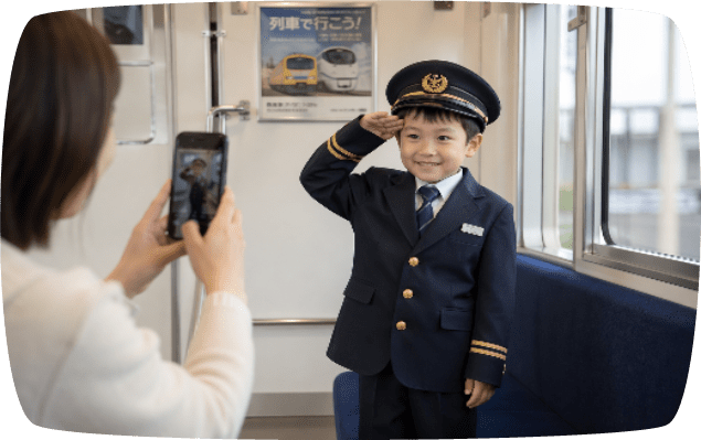 運転士の制服を着たこども